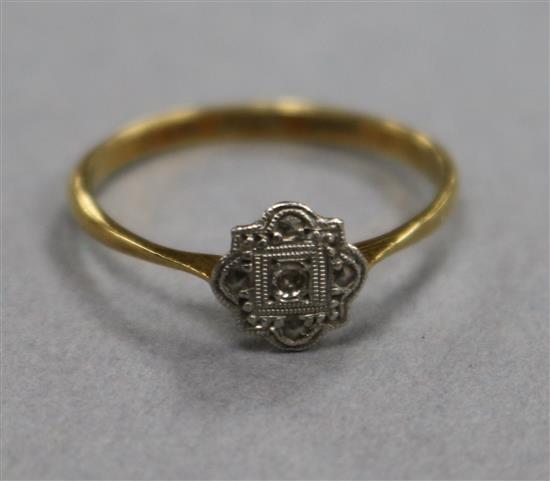 A 1920s 18ct gold, platinum and diamond cluster ring, size O.